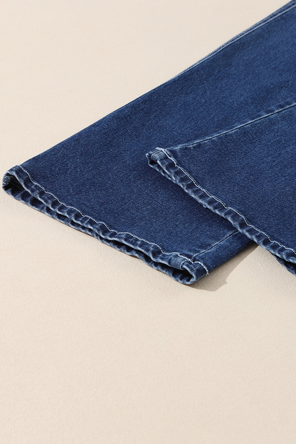 Light blue Mckinley wide leg cropped jeans by Threaded Pear, showing the relaxed fit and cropped length on a model.