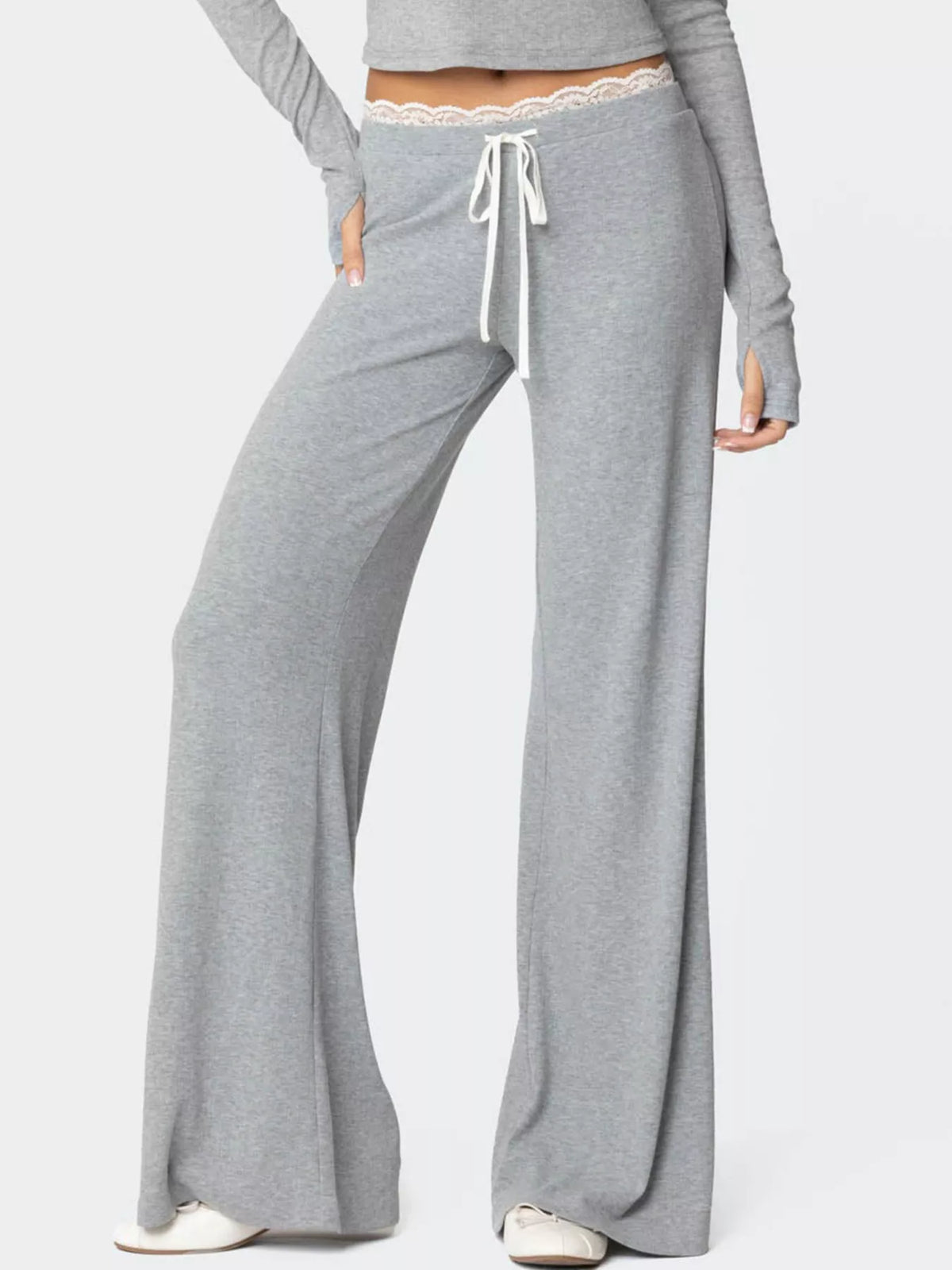 Women's wide leg lounge pants by Plush Fashion Hub with lace trim and tie waist, shown in a relaxed fit and stylish design.