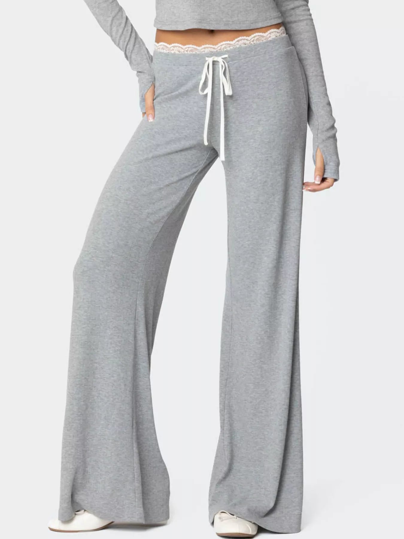 Women's elegant wide leg lounge pants by Trendsi with lace trim and tie waist, shown in a relaxed fit.