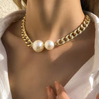18K gold-plated pearl necklace with lustrous white pearls and delicate chain, elegant jewelry accessory.