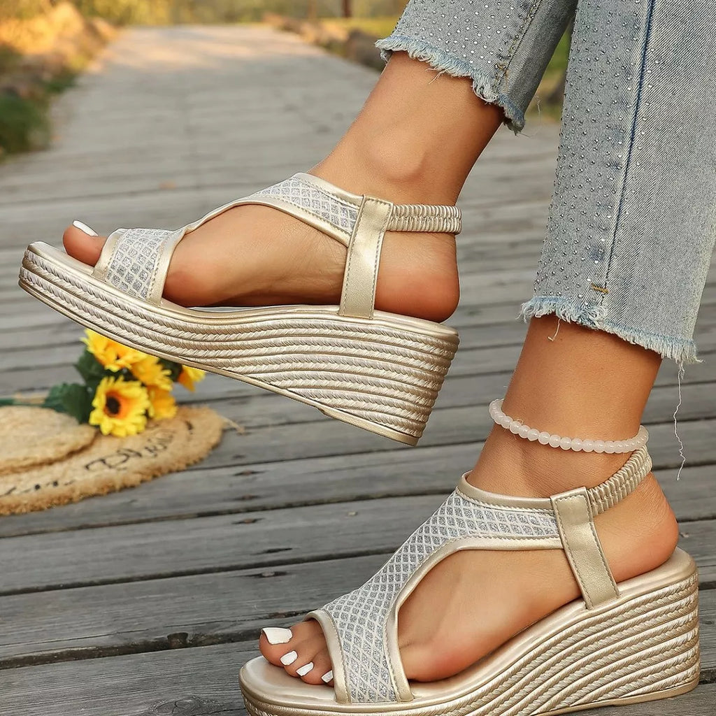 Open toe wedge sandals by Shopimist featuring a stylish design with a comfortable wedge heel and open-toe style.