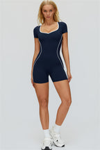 Fitglutes Activewear The Whisper Romper in black, featuring a fitted design with athletic fabric and sporty cut for workout comfort.