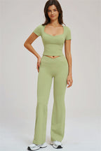 Fitglutes Activewear two-piece set featuring a Sizzle T-shirt and flared leggings, perfect for gym and workout sessions.