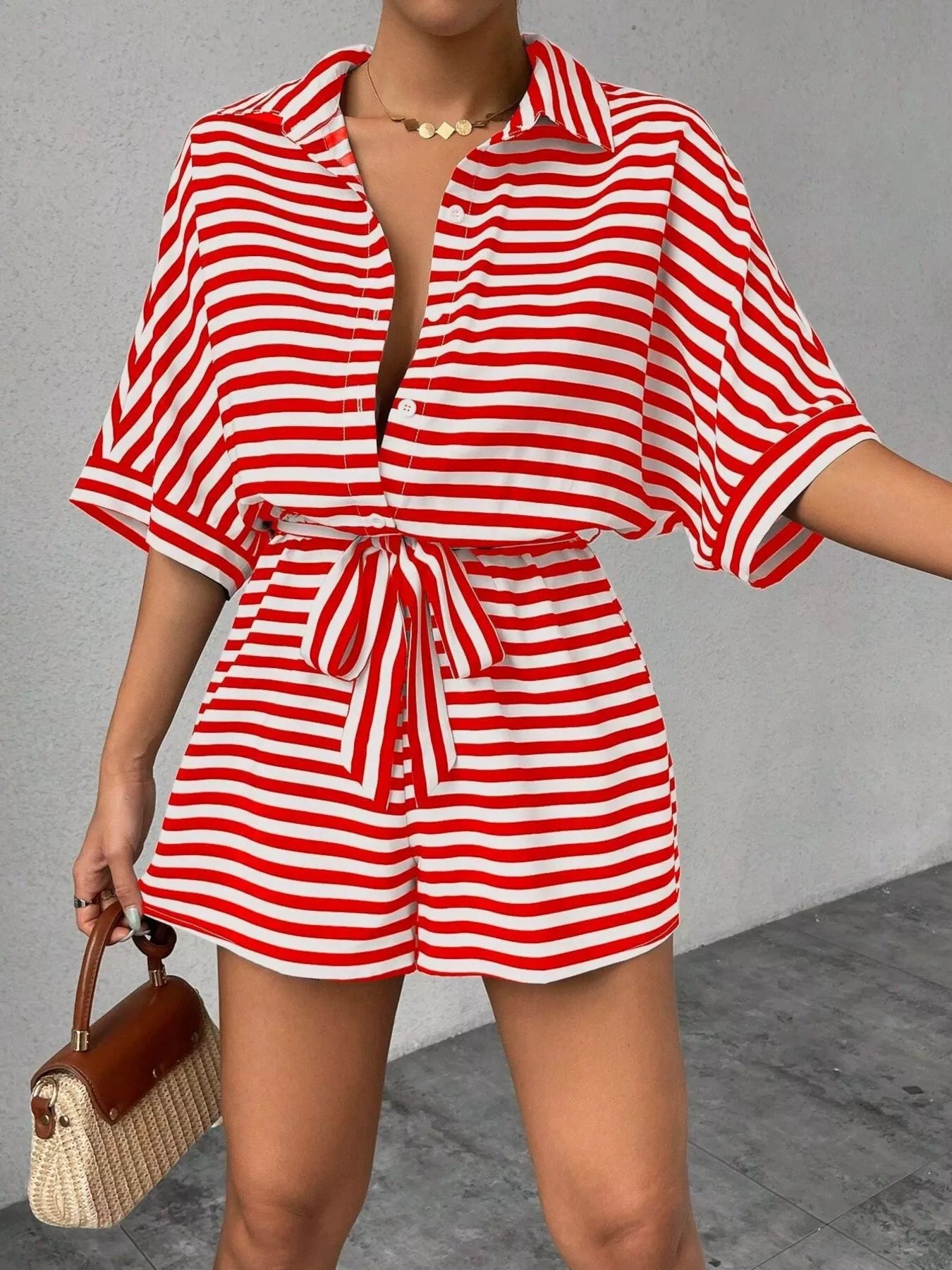 Striped Plush Fashion Hub button front half sleeve romper shirt with a casual design and front button closure.