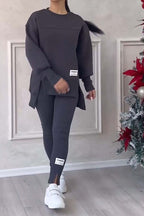 Women's solid color 2-piece casualwear set by Plush Fashion Hub, featuring a relaxed fit top and matching pants in a comfortable fabric.
