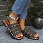 Open toe buckle sandals by Shopimist featuring stylish straps and a comfortable sole, perfect for casual summer wear.