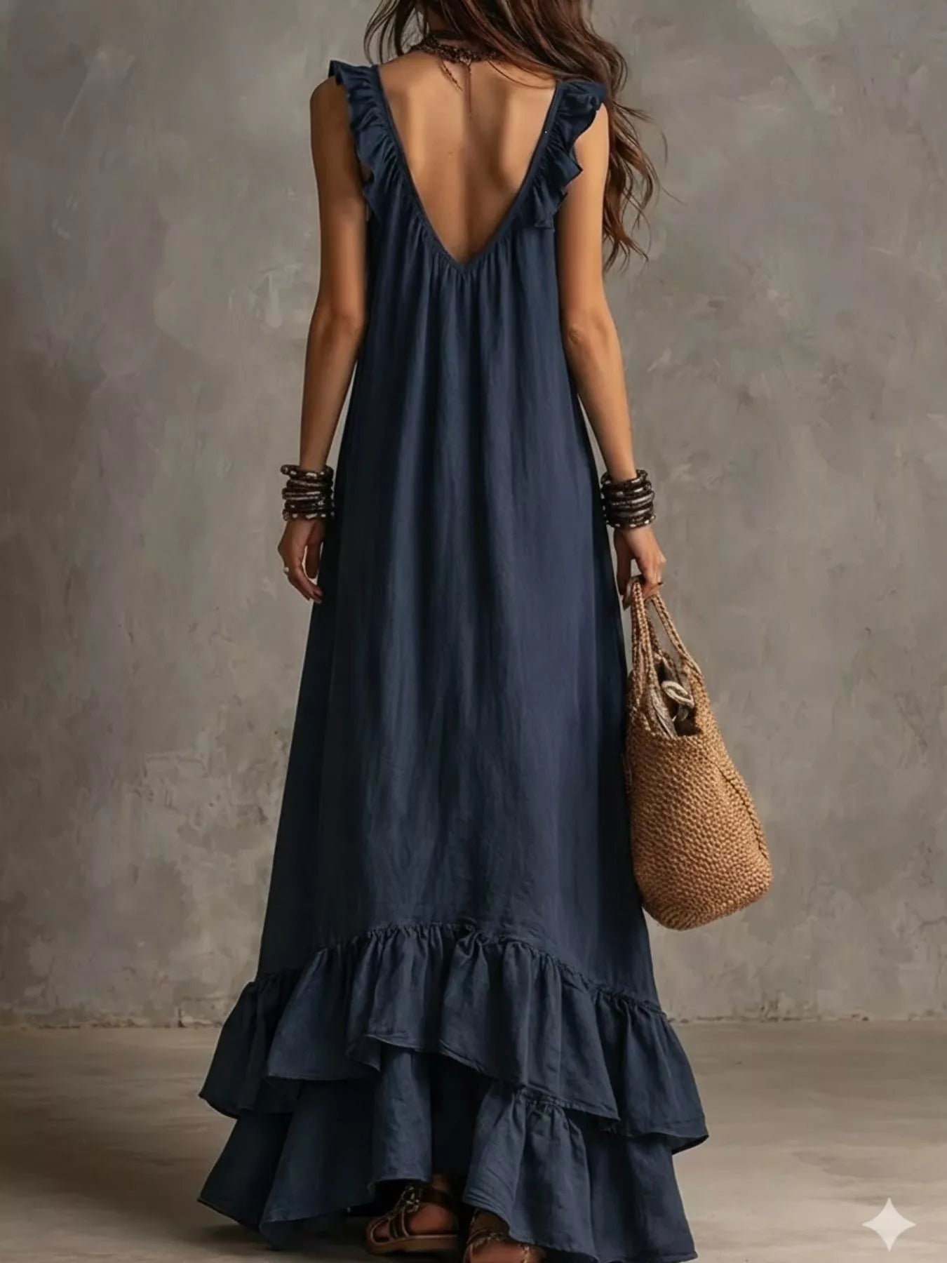 Plush Fashion Hub ruffled sleeveless maxi dress with flowing fabric and elegant design, perfect for summer or special occasions.