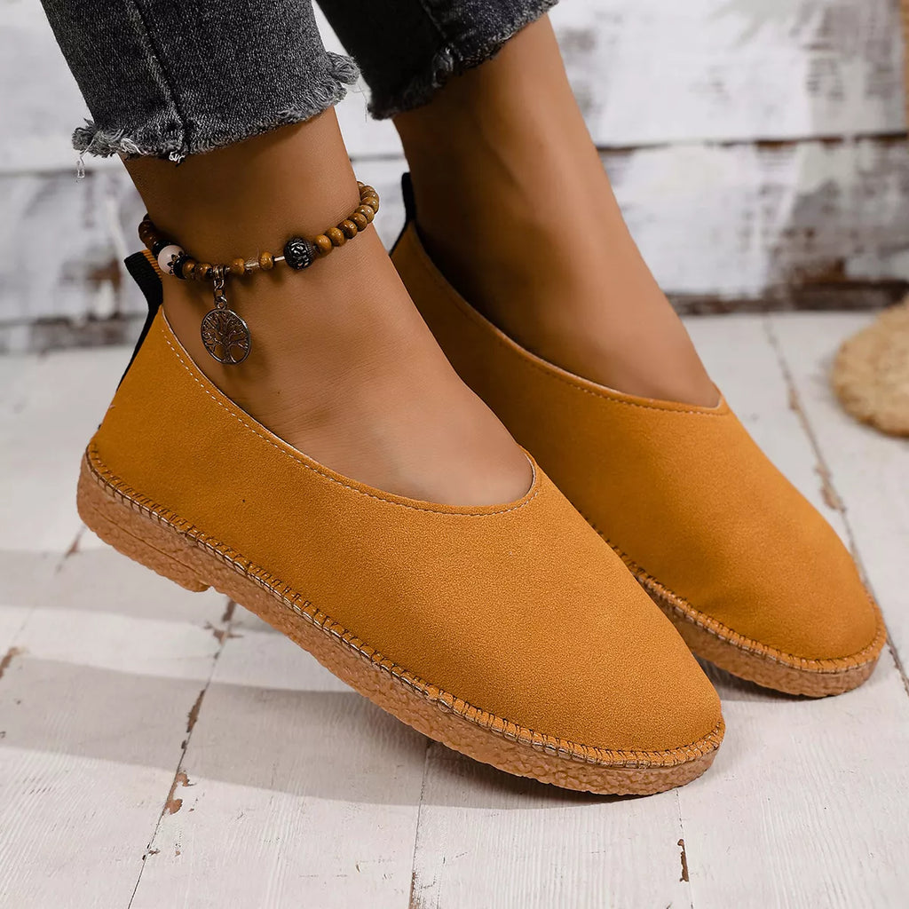 Shopimist round toe flats slip-ons with sleek design, featuring smooth material and comfortable fit for everyday wear.