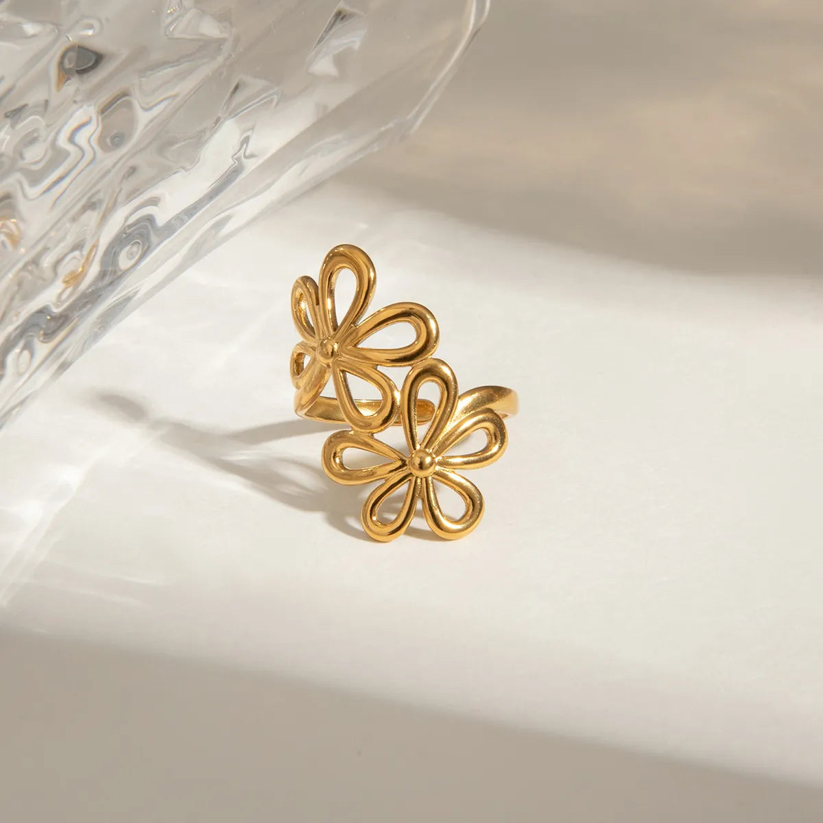 Stainless steel flower ring from Plush Fashion Hub featuring a detailed floral design and polished finish.