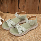 Women's open toe woven strap flat sandals made of faux leather, featuring comfortable slide design by Trendsi
