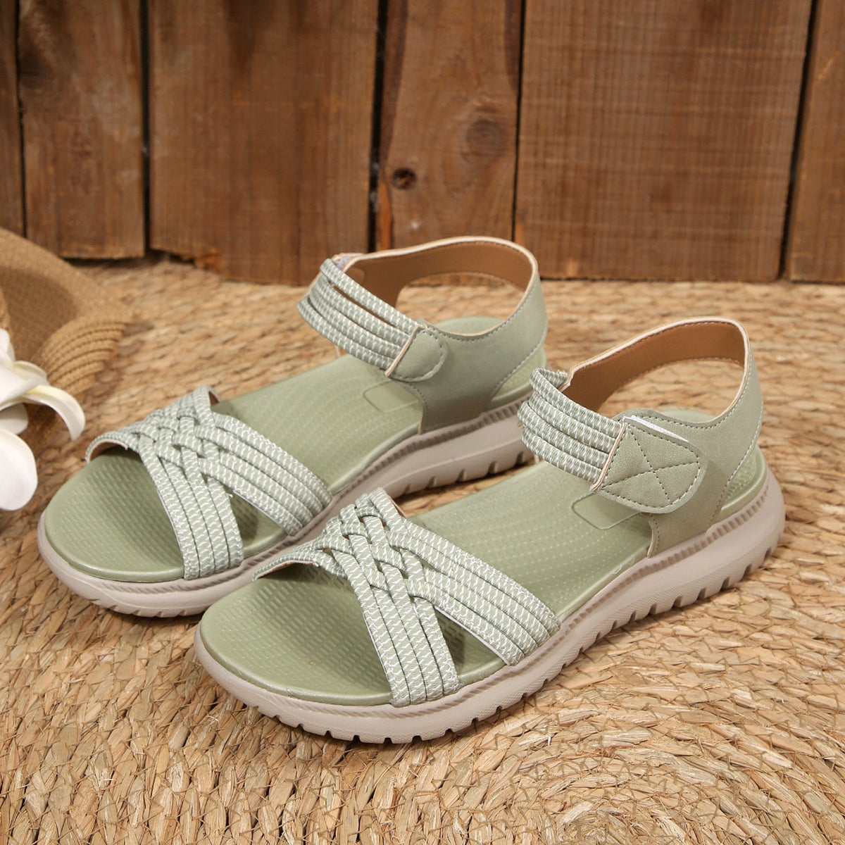 Women's open toe woven strap flat sandals made of faux leather, featuring comfortable slide design by Trendsi