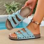 Shopimist triple buckle adjustable sandals featuring leather straps and a comfortable flat sole, perfect for casual summer wear.