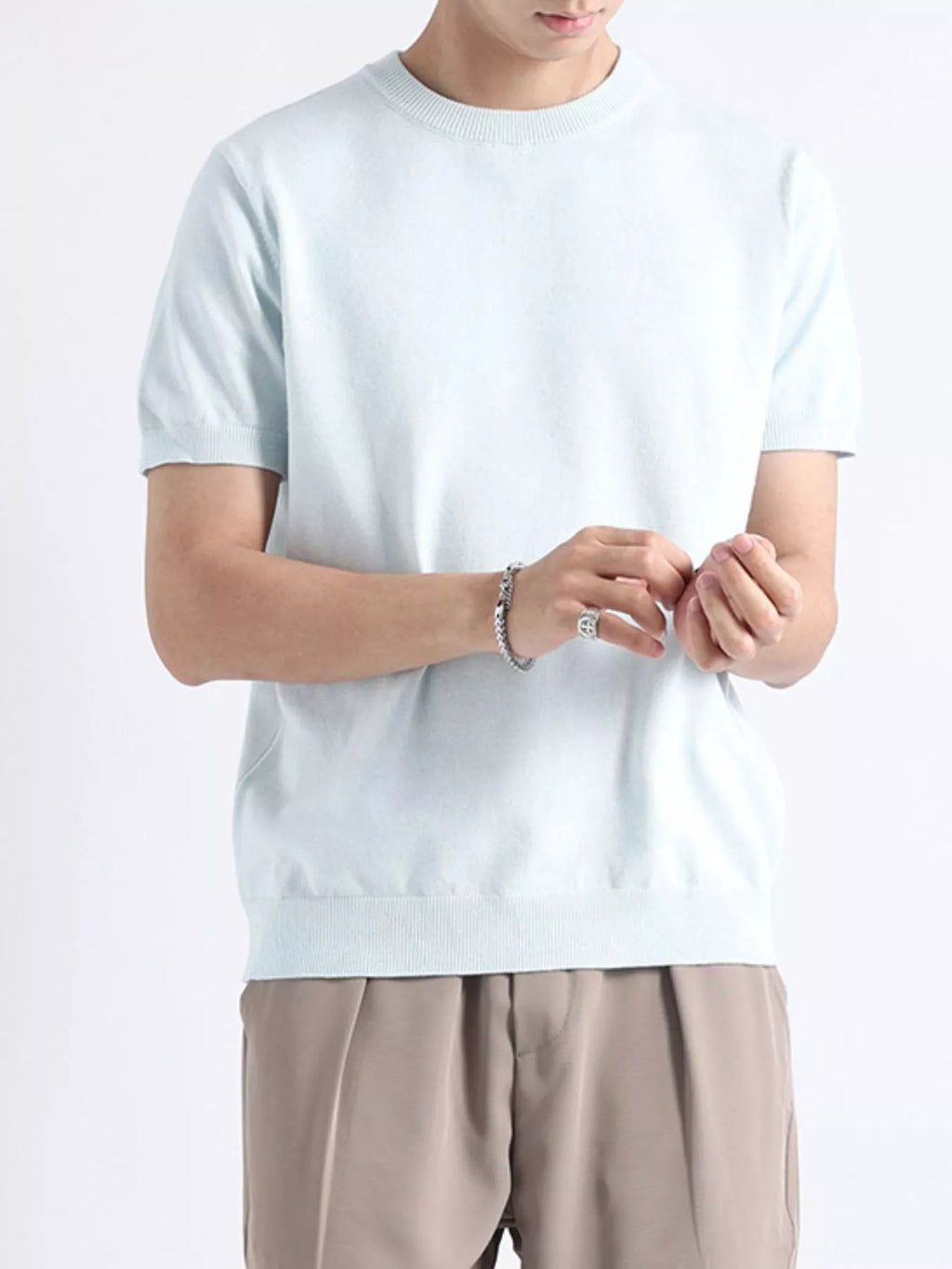 Plus size men's casual knitted short sleeve T-shirt by Trendsi, shown in a relaxed fit with a soft knit fabric.