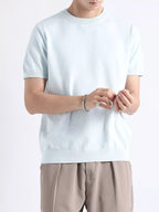 Plus size men's casual knitted short sleeve T-shirt by Trendsi, shown in a relaxed fit with a soft knit fabric.