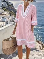 Plus size striped V-neck casual dress by Shopimist, featuring a full-length design and comfortable, stylish fit.