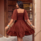 Women's floral embroidered ruffle short-sleeve midi dress by FitiqueFit, featuring a feminine floral pattern and ruffle details.