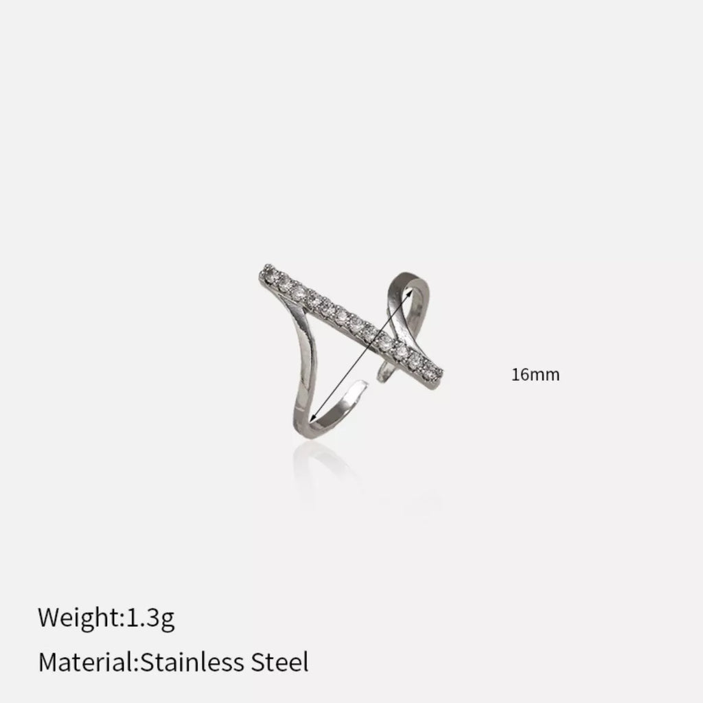 Irregular rhinestone ring by Shopimist featuring a unique, sparkling design with uneven gemstone accents on silver-toned band.