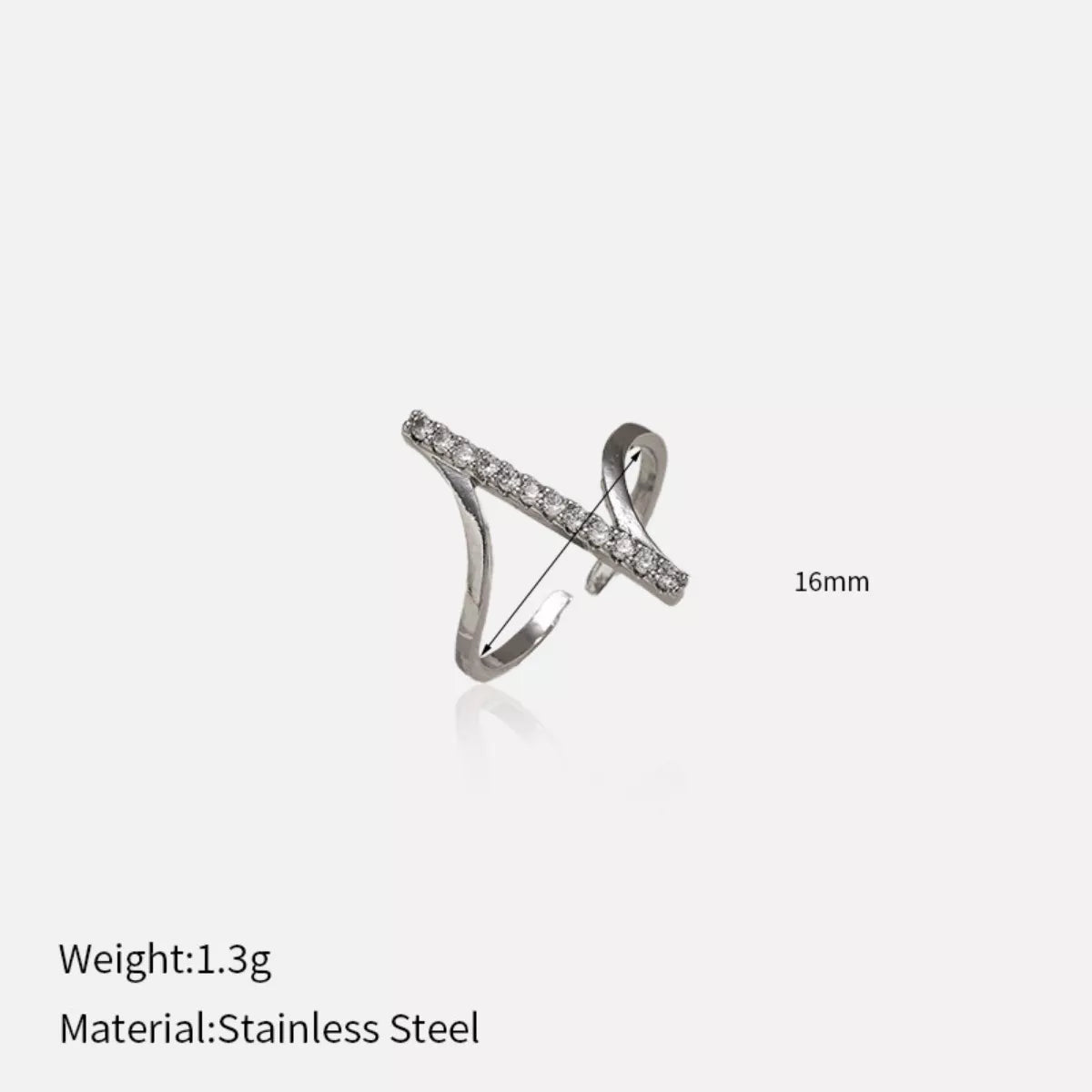 Irregular rhinestone ring by Shopimist featuring a unique, sparkling design with uneven gemstone accents on silver-toned band.