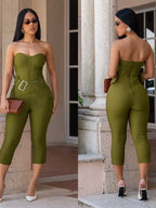 Black belted tube skinny jumpsuit from Trendsi featuring a fitted silhouette and sleeveless design, ideal for casual or dressy occasions.