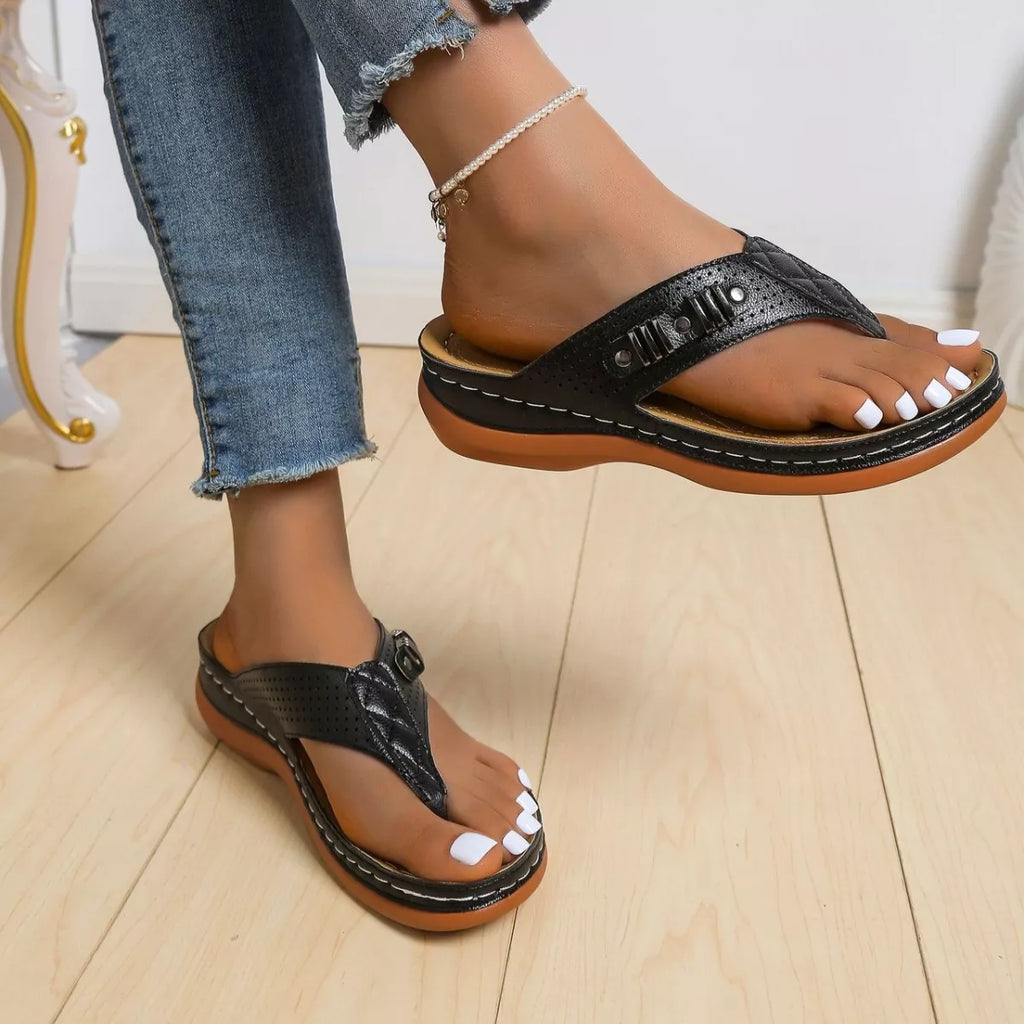 Women's comfortable toe post wedge sandals by Trendsi, stylish summer footwear featuring a wedge heel and open-toe design.
