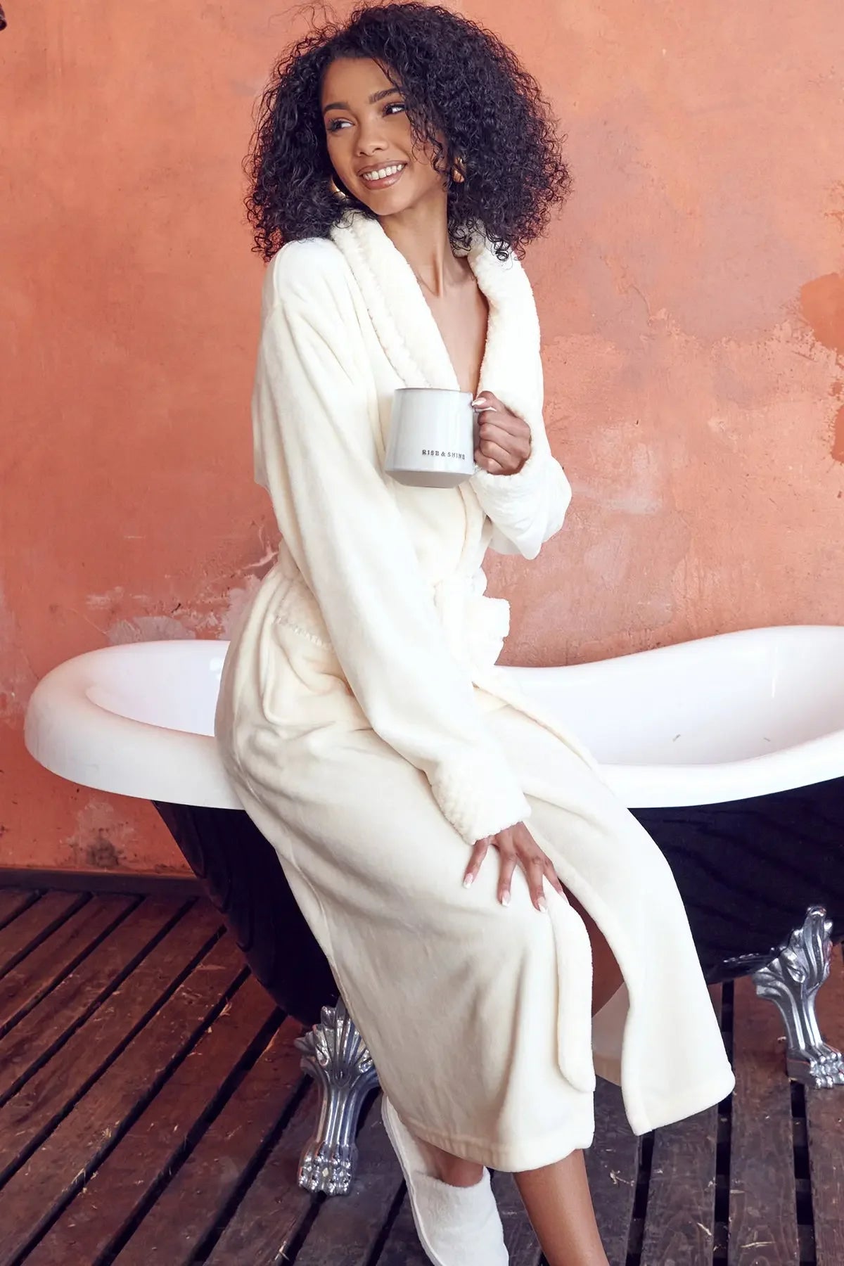 Women's ultra-soft plush bathrobe from Plush Fashion Hub, showing cozy fleece material and relaxed fit for comfortable lounging.