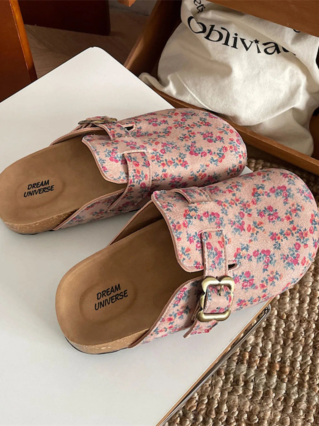 Women's floral print round toe slip-on flats by Trendsi, casual comfortable walking shoes with a colorful floral pattern.