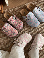 Women's floral print slip-on flats with round toe, casual walking shoes by Trendsi, featuring a colorful floral pattern and comfortable design.