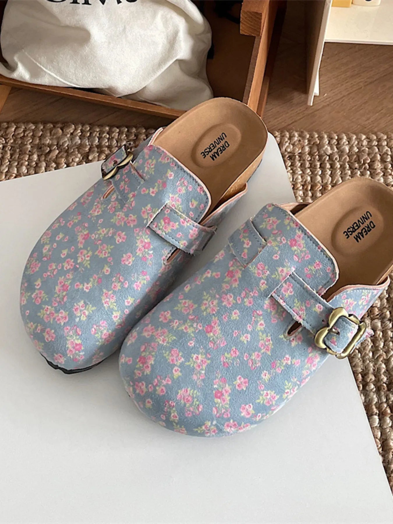 Women's floral print round toe slip-on flats by Trendsi, comfortable casual walking shoes with colorful floral pattern and easy slip-on design.