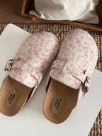 Women's floral print round toe slip-on flats, comfortable casual walking shoes by Trendsi, featuring a stylish floral pattern and easy slip-on design.