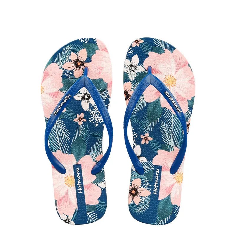 Women's floral print toe post flat sandals by Trendsi, featuring colorful summer beach slide shoes with comfortable design.