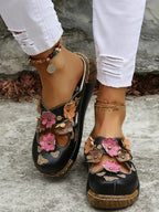 Floral round neck flat sandals in premium PU leather, stylish summer footwear with floral design and comfortable flat sole.