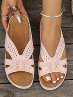 Women's floral comfort wedge sandals with low heel, stylish PU leather shoes featuring a colorful flower design.