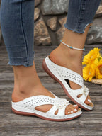 Women's floral comfort wedge sandals by Trendsi, featuring stylish low heel and PU leather straps.