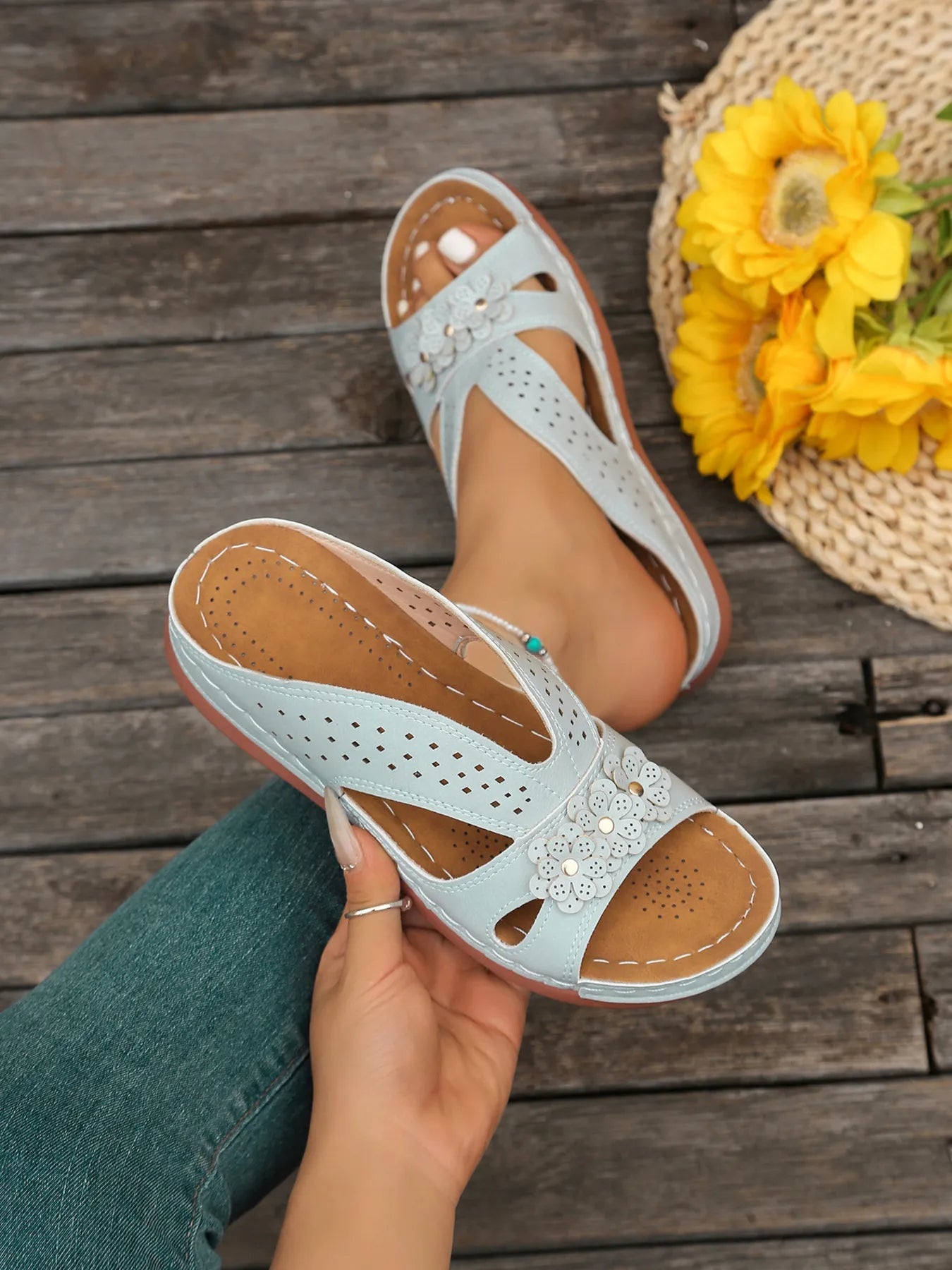 Women's floral comfort wedge sandals by Trendsi, low heel PU leather shoes with a colorful flower design and stylish, comfortable fit.