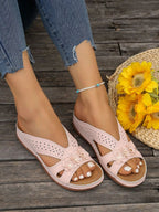 Women's floral comfort wedge sandals with low heel, made of PU leather, featuring a stylish floral design and comfortable fit.