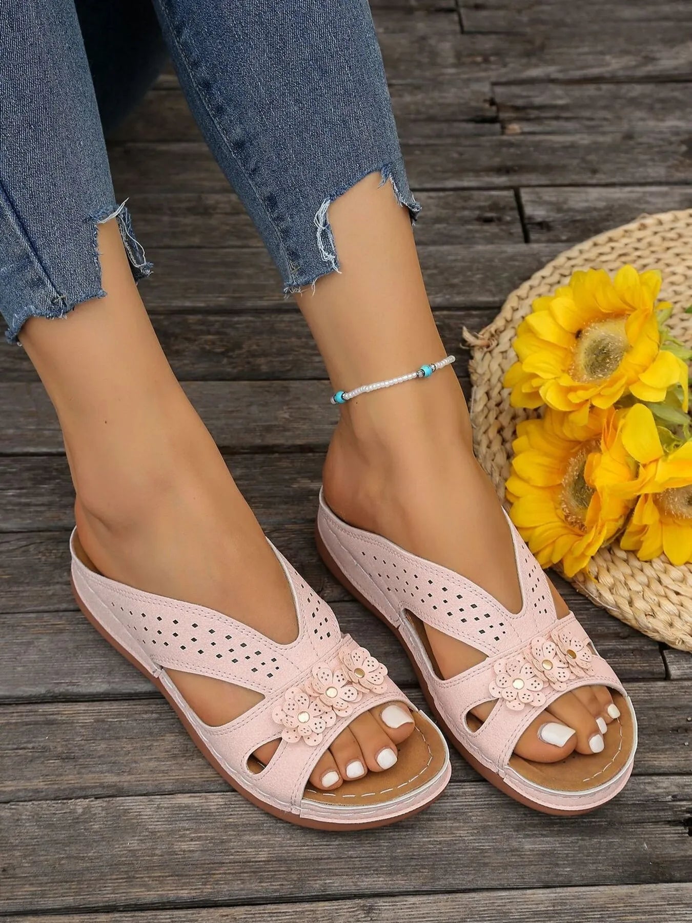 Women's floral comfort wedge sandals with low heel, made of PU leather, featuring a stylish floral design and comfortable fit.