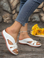 Women's floral comfort wedge sandals with low heel and PU leather straps, stylish and supportive for casual wear.