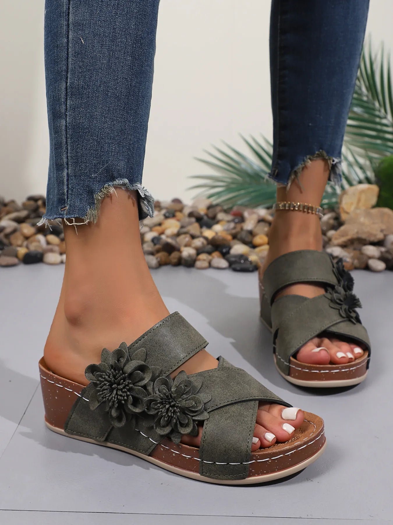 Women's floral crisscross wedge sandals with a comfortable mid-heel design, perfect for summer wear.