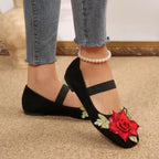 Women's floral square toe slip-on shoes by Trendsi, featuring a comfortable flat design with a colorful flower pattern.