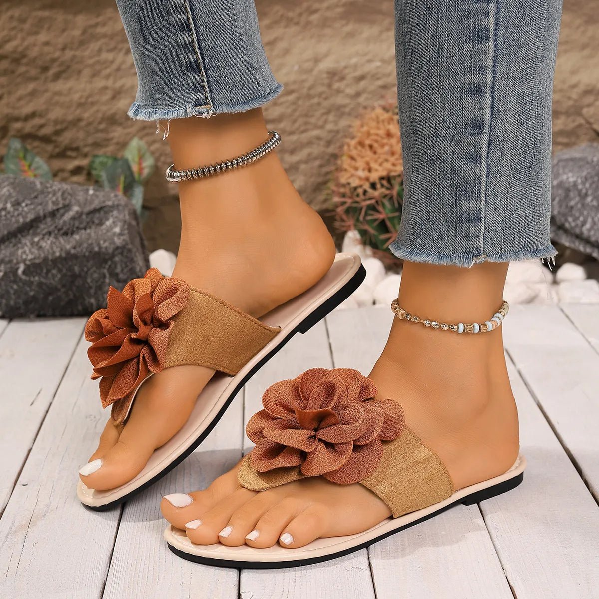 Women's floral toe post flat sandals in premium faux leather with colorful flower design, casual summer footwear by Trendsi.