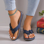 Flower toe post sandals by Trendsi featuring comfortable PU leather straps and a low heel, perfect for summer wear.