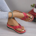 Flower toe post sandals by Trendsi featuring comfortable PU leather straps and a low heel, perfect for summer footwear.