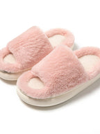 Soft plush open-toe faux fur slippers for women, cozy indoor house shoes with fluffy comfort from Trendsi.