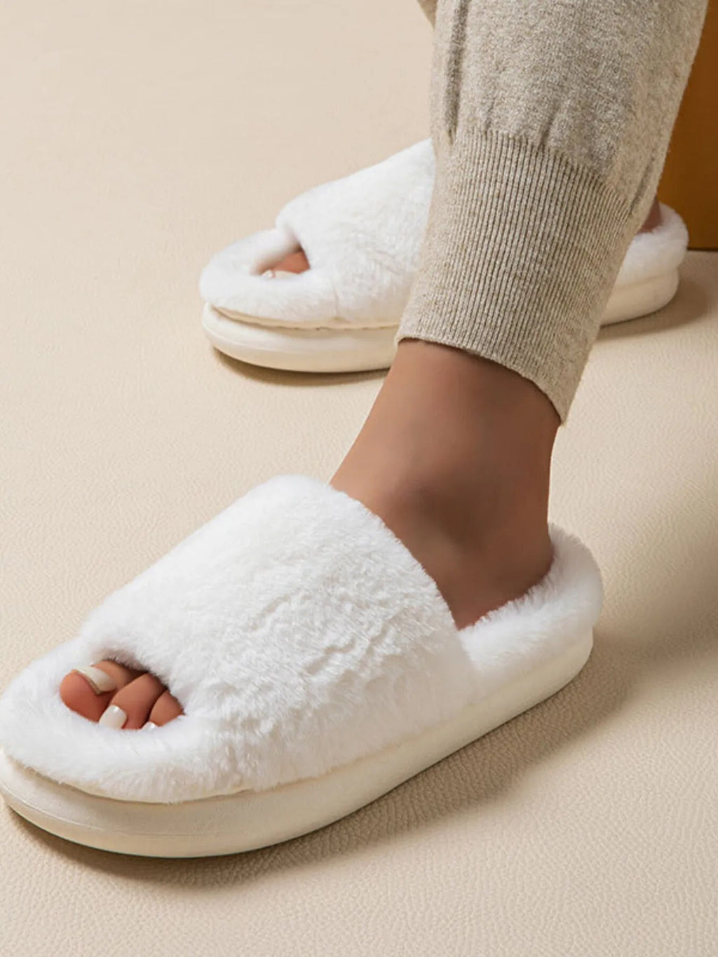 Fluffy open-toe faux fur slippers for women, soft indoor house shoes with plush comfort, ideal for cozy indoor wear.