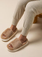 Soft plush open-toe faux fur slippers for women, cozy indoor house shoes with fluffy comfort from Trendsi.