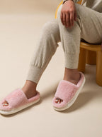 Fluffy open-toe faux fur slippers for women, soft indoor house shoes with plush comfort and cozy design.