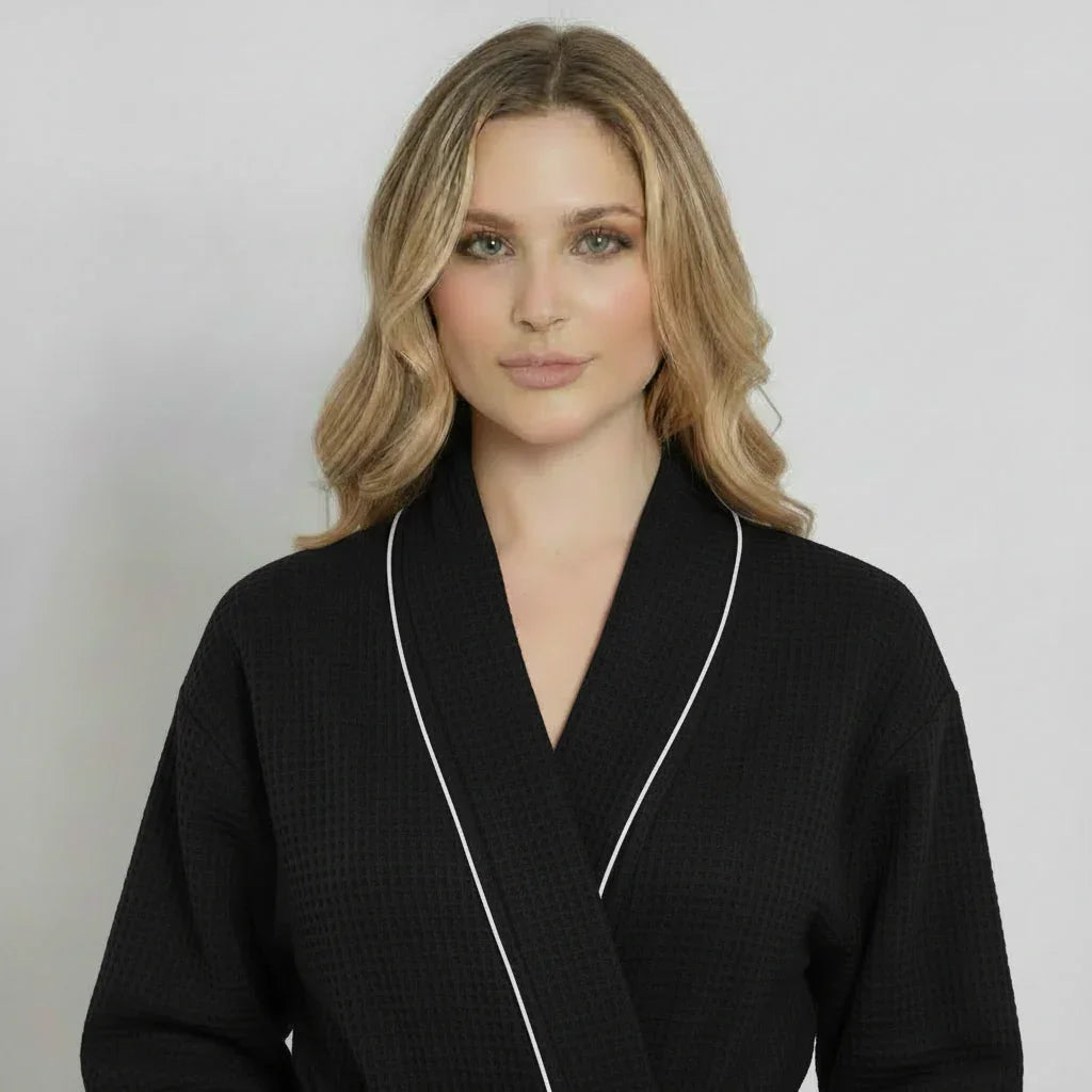 Women’s black waffle piping bathrobe from Plush Fashion Hub, lightweight spa-style robe with front small piping details.