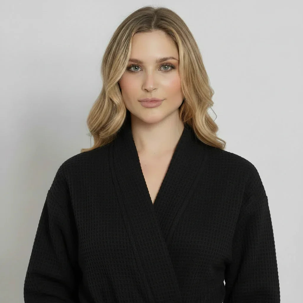 Black women's waffle robe from Plush Fashion Hub, lightweight and quick-dry spa comfort, front view with small size.