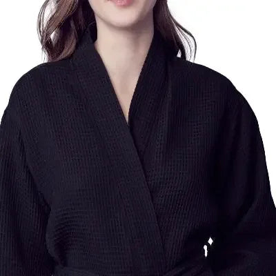 Black knee-length waffle robe for women by Plush Fashion Hub, front view showing textured fabric and cozy fit.