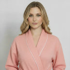 Small blush women's waffle piping bathrobe by Plush Fashion Hub, featuring lightweight spa-style comfort and cozy front design.
